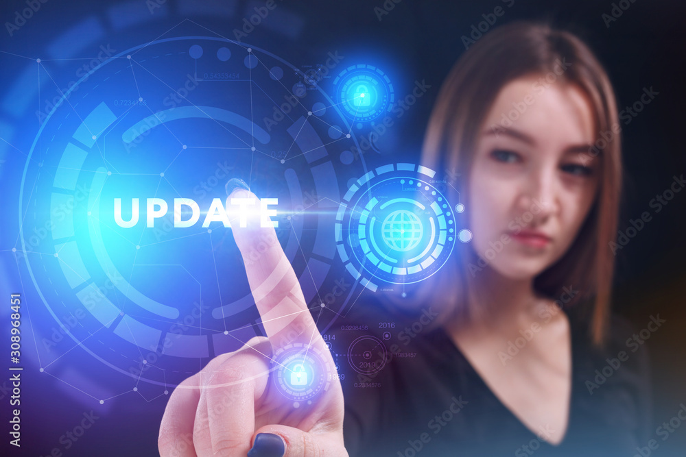 Business, Technology, Internet and network concept. Young businessman working on a virtual screen of the future and sees the inscription: Business, Technology, Internet and network concept. Young businessman working on a virtual screen of the future and sees the inscription: