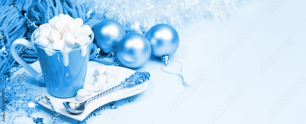 Christmas banner toned in 2020 Classic Blue. Cup of cocoa with cream and marshmallows, Christmas decorations. Christmas banner toned in 2020 Classic Blue. Cup of cocoa with cream and marshmallows, Christmas decorations.