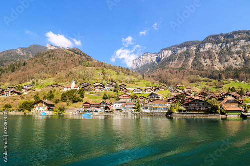 Beautiful view of lake Thun and many houses during spring season with mountain background, Thun, Switzerland