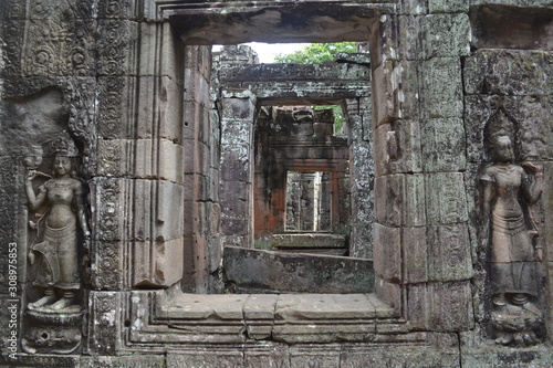 Windows and decorative elements of an ancient temple in the Angkor Wat complex