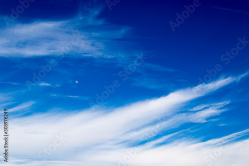 Blue sky and beautiful clouds, abstract nature background.