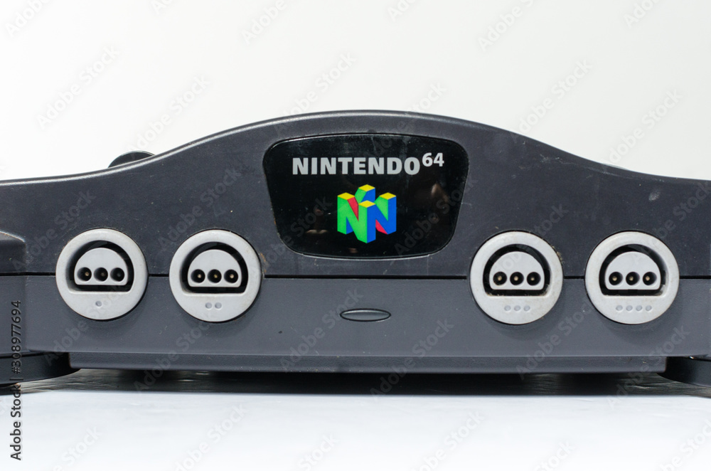 london, england 05/052019 Nintendo n64 Console on a white isolated  background. iconic retro vintage video gaming machine. Japanese technology  64 bit gamers. Stock 写真 | Adobe Stock