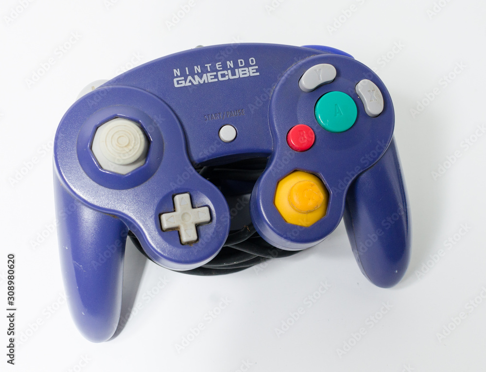london, england 05/052019 A Purple Nintendo Game Cube Console on a ...