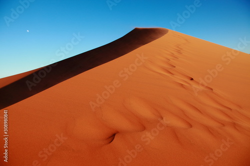 Huge Red sand dunes in Sossusvlei desert in Namibia in the sunrise