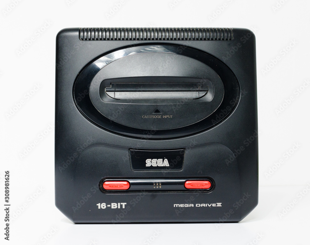 london, england, 05/05/2018 Sega megadrive 2 16 bit and Sega Mega drive 2  black shiny plastic retro arcade vintage gaming. Retro arcade gaming  history. home entertainment. Stock Photo | Adobe Stock