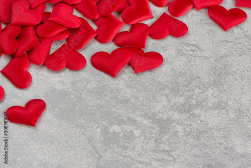 Pink silk hearts on gray ctone