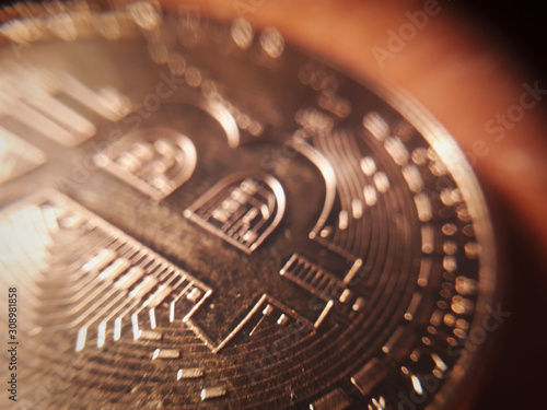 Virtual cryptocurrency money Bitcoin golden coin super macro