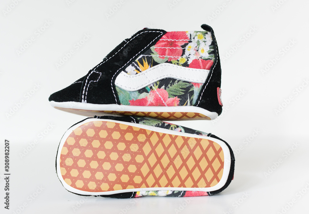 london, england, 05/08/2019 VANS SK8 HI CRIB newborn Babies Skate Shoes Soft  Sole, Black and flower floral print. trendy babies shoes. vans off the wall  baby shoes. Stock Photo | Adobe Stock