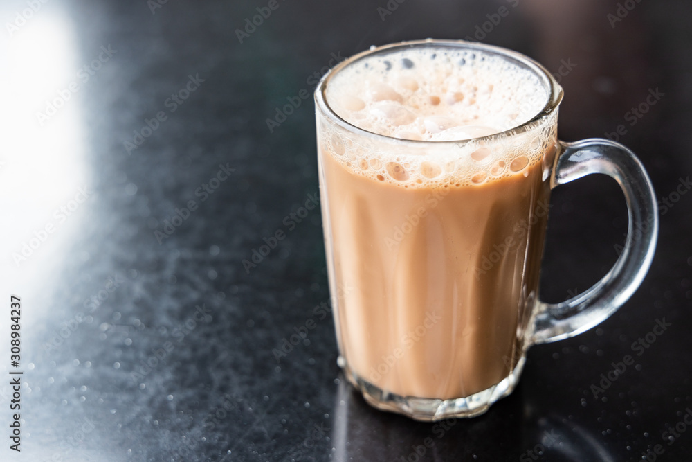 Teh tarik, milk tea with froth. Popular drink in Malaysia. Teh tarik, milk tea with froth. Popular drink in Malaysia.