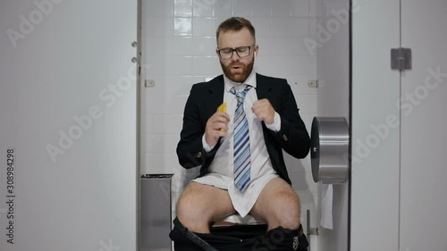 Businessman listening music and doing silly movements