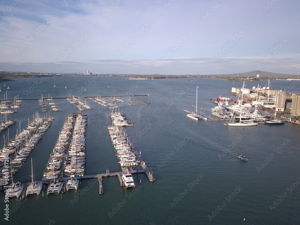 Westhaven, Auckland / New Zealand - December 11, 2019: The beautiful scene surrounding the St Marys Bay and Westhaven area, with the Auckland Landmark Bridge behind it.