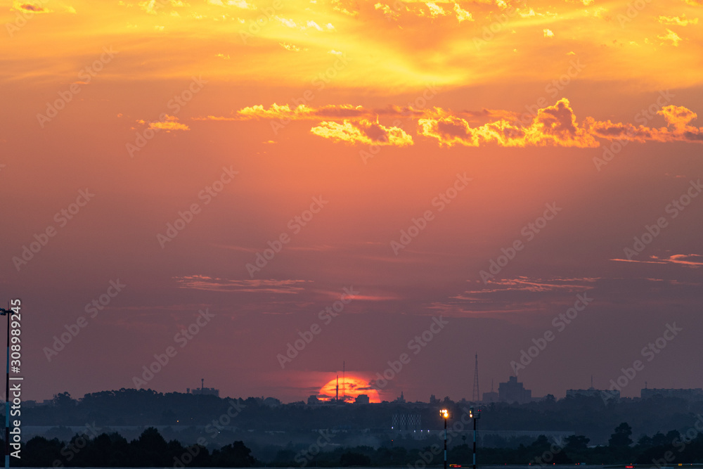 Obraz premium sunset over city