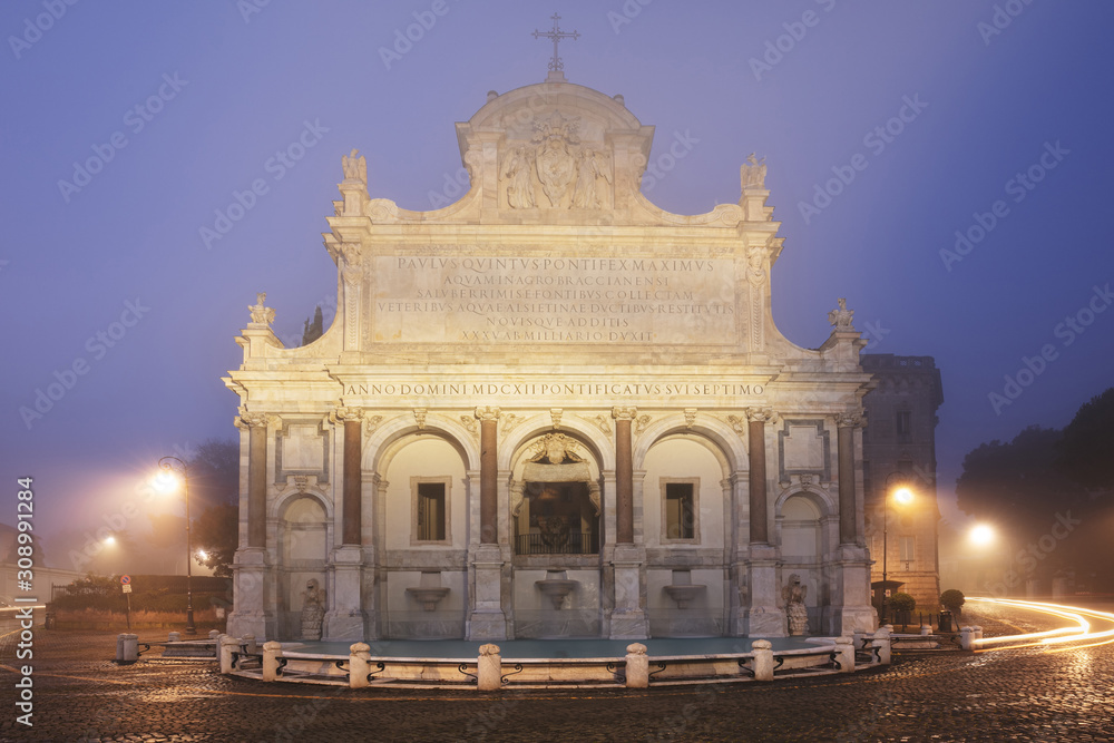 Obraz premium The Fontana dell'Acqua Paola (Fontanone) by the fog, Janiculum, Rome, Italy