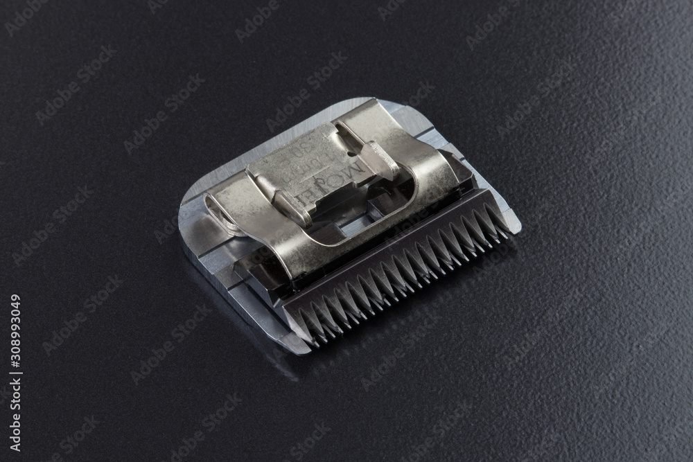Moving part of a trimmer blade block Moving part of a trimmer blade block