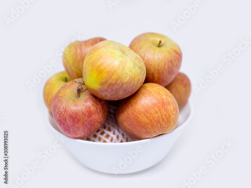 red Apple Honey Core in a bowl on white background