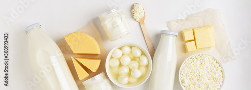 Dairy and fermented milk fermented organic products on a white background. Milk kefir yogurt butter cheese assortment.