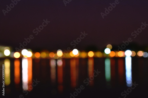  blurry light of building on river background and texture 