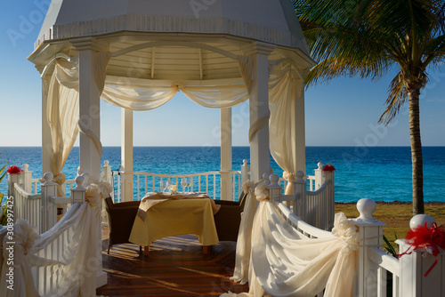 Photography Wedding Chapel with table set for bride and groom at a Varadero Cuba beach resor