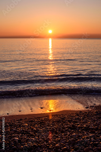 sunrise on the beach of Oropesa, Valencia, Spain photo