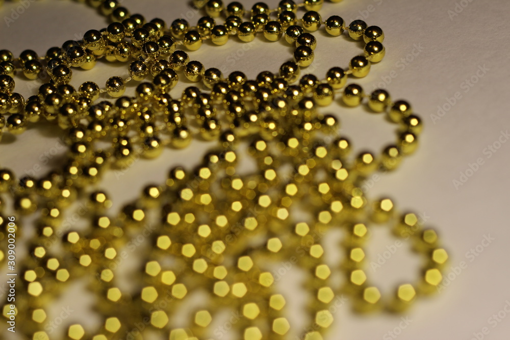 Golden bokeh from the beads Golden bokeh from the beads