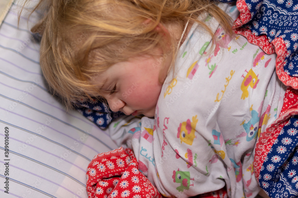 A sleeping child. Daytime sleep A sleeping child. Daytime sleep