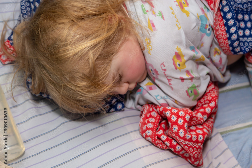 A sleeping child. Daytime sleep A sleeping child. Daytime sleep