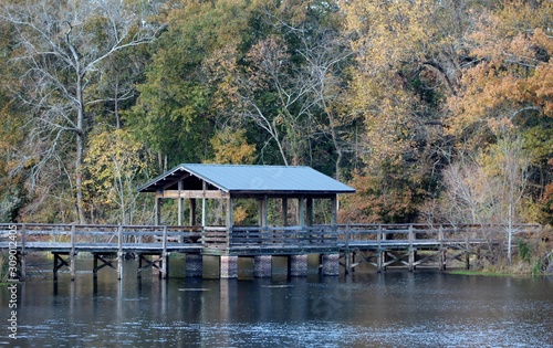 covered bridge on a pond