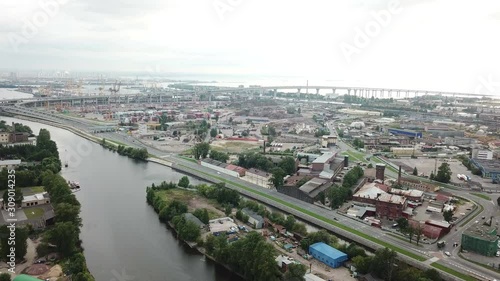 Wallpaper Mural Drone view of the industrial part of St. Petersburg, Kanonersky island with Western high-speed diameter and the Gulf of Finland on the horizon Torontodigital.ca