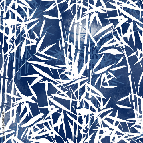 Watercolor seamless tropical pattern in traditional blue indigo shades. Bamboo - reed with stems and branches