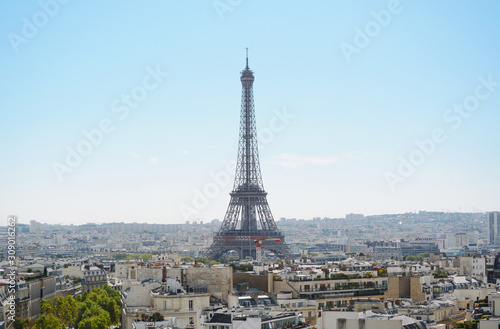 Eiffel Tower rises above the city of Paris