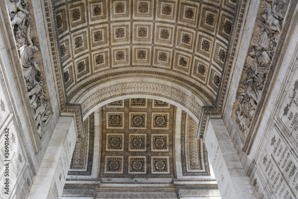 Sculpted roses and reliefs on the Arc de Triomphe