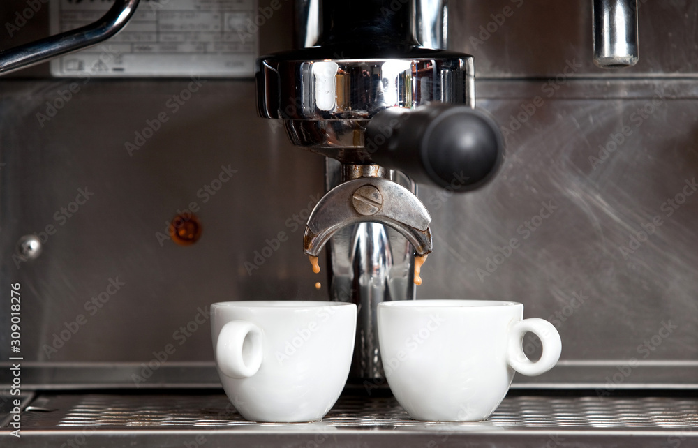 Cup of coffee in coffe machine Cup of coffee in coffe machine
