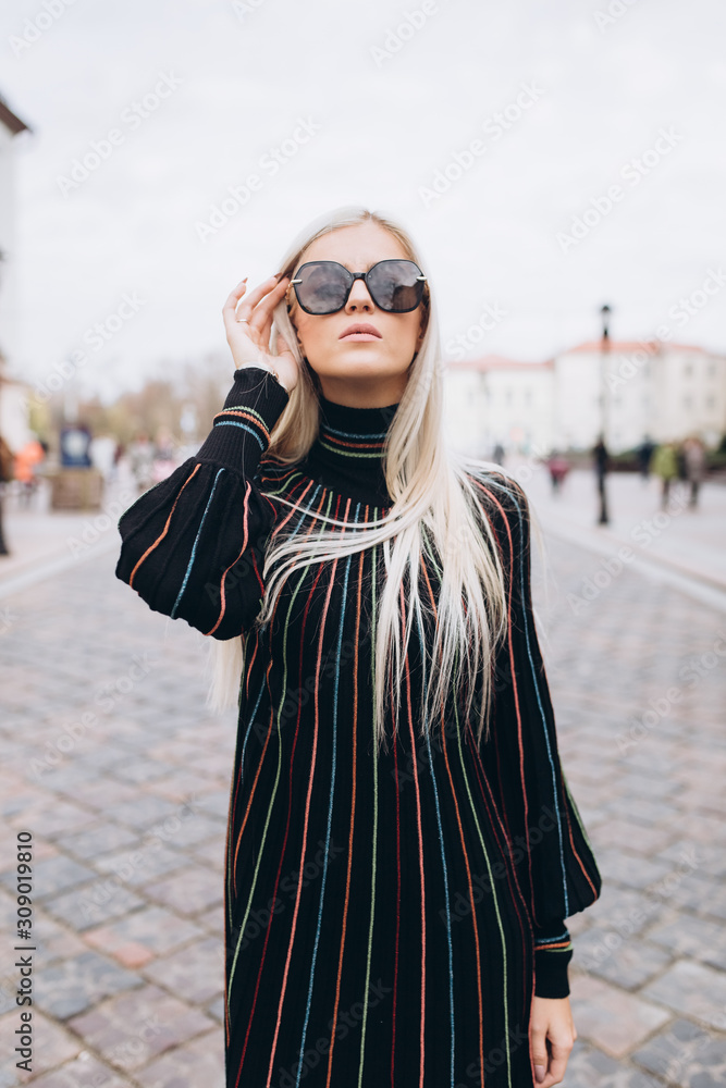 Close up portrait of beauty fashion caucasian blondie young woman in hat and sun glasses outdoors. Beauty, fashion concept Close up portrait of beauty fashion caucasian blondie young woman in hat and sun glasses outdoors. Beauty, fashion concept