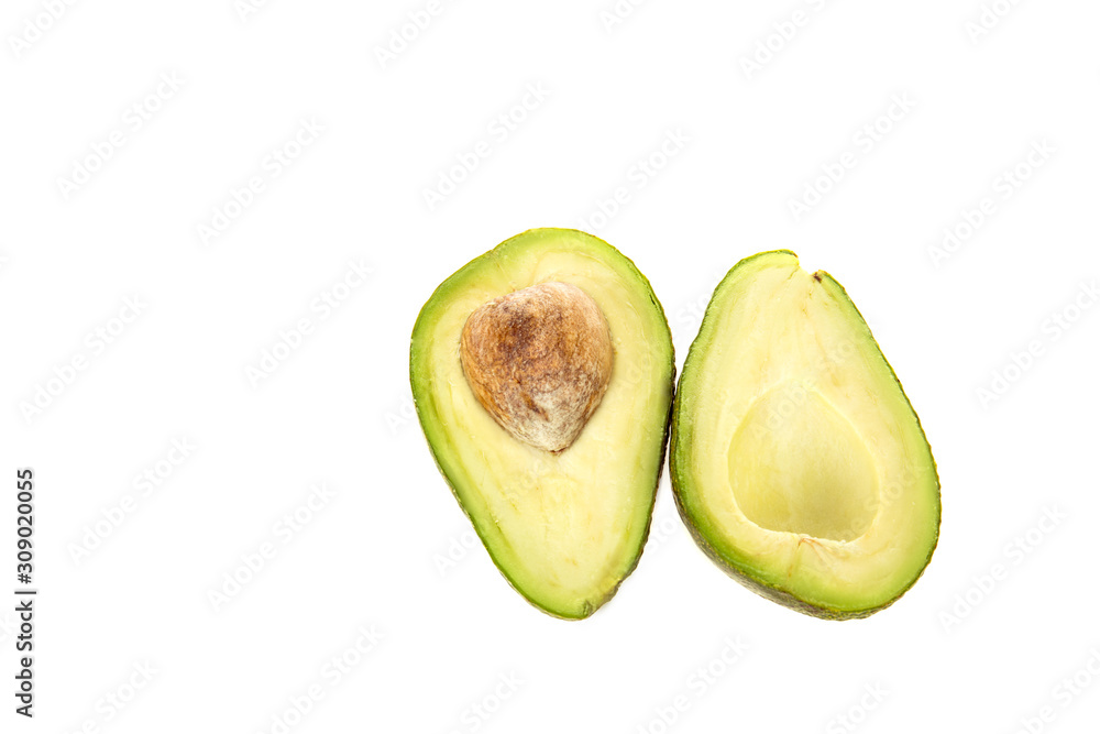 top view of delicious cut avocado with seed isolated on white