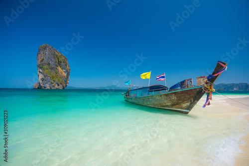 Beautiful beaches and longtail boat at Pucket, Thailand