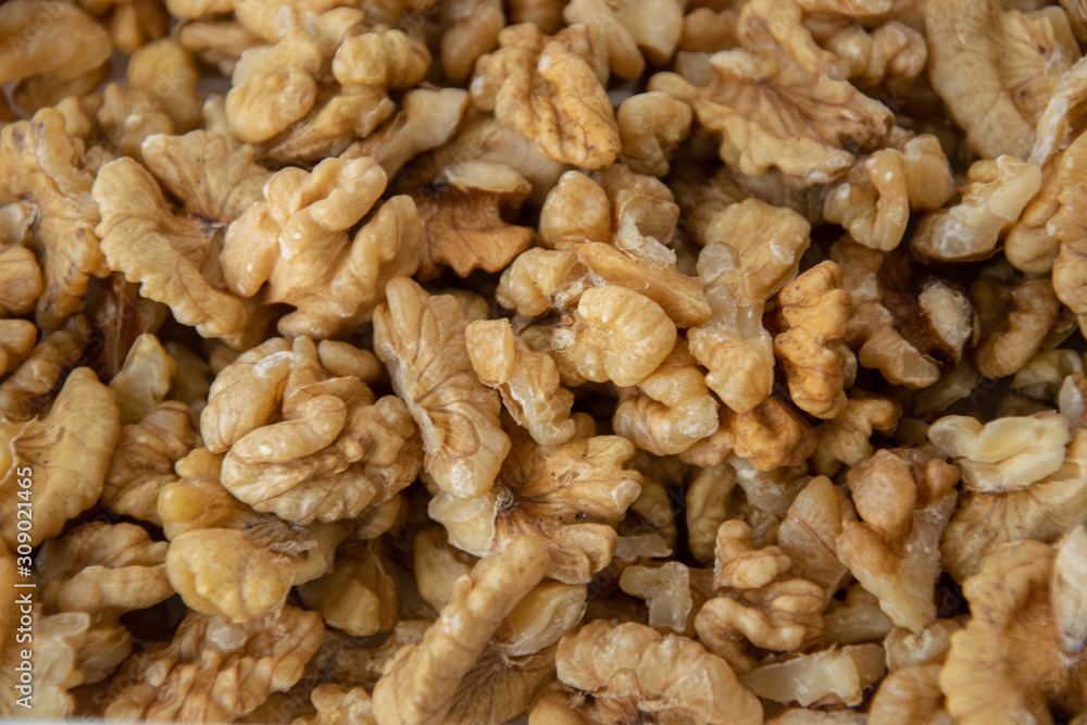 dried shelled walnut halves background dried shelled walnut halves background