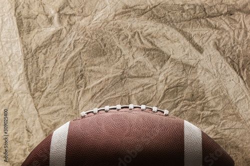 Classic american football ball on background