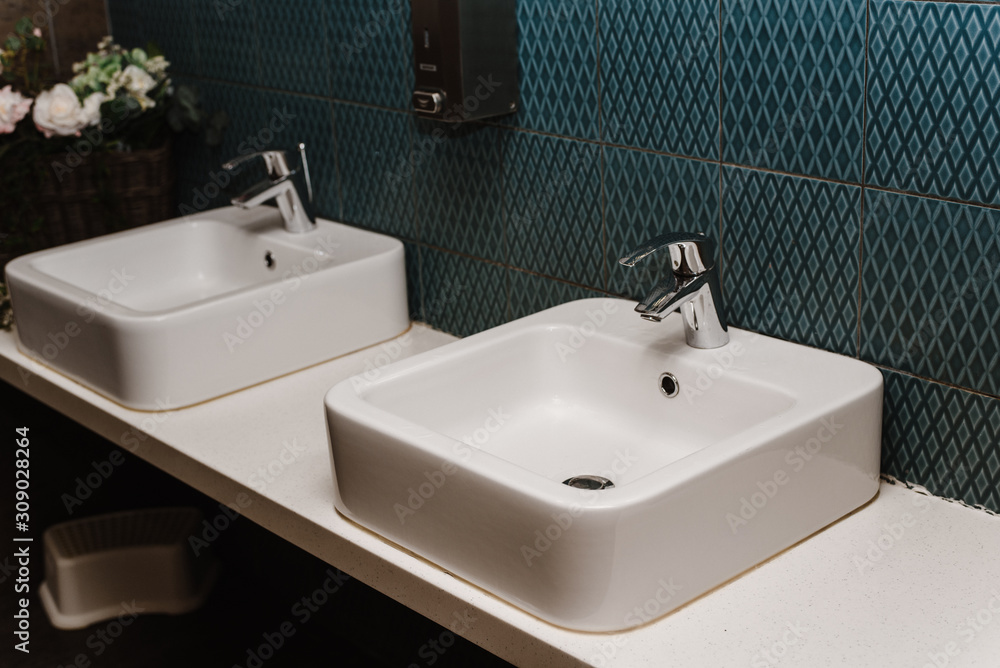 Fototapeta premium Toilet sink interior of public toilet with of washing hands. Close up