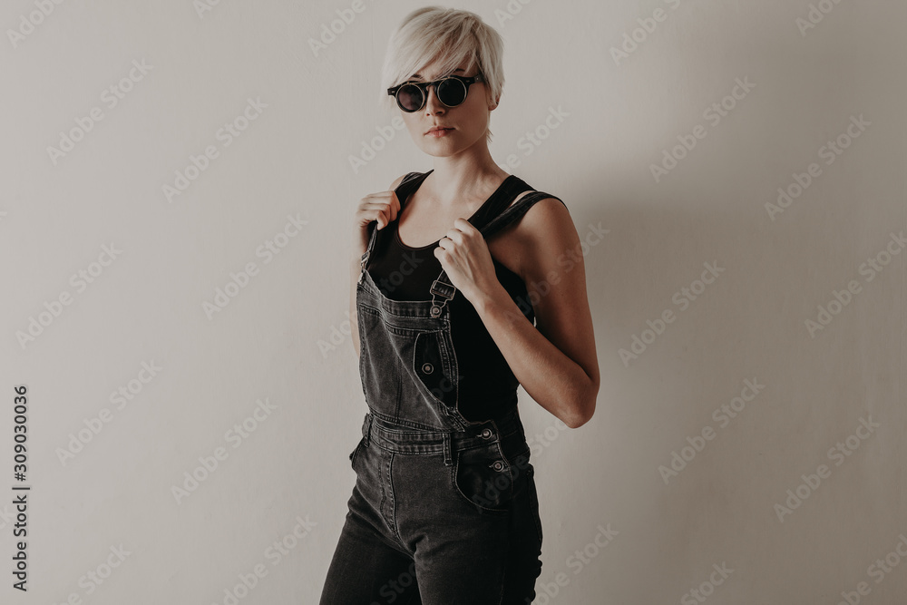 girl guy with short hair and glasses girl guy with short hair and glasses