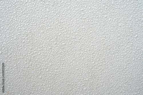 White metal surface background with water drops.