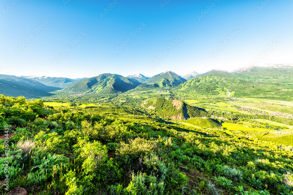 Morning sunrise high wide angle view from Sunnyside Trail in Aspen, Colorado in Woody Creek neighborhood in 2019 summer with roaring fork valley