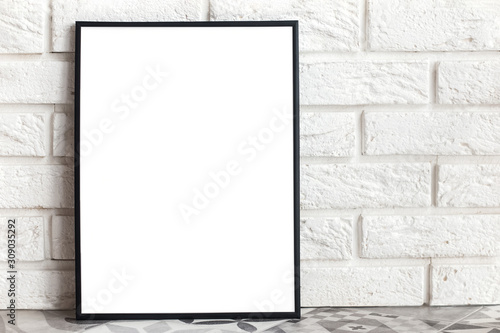 Empty frame mock-up in minimalist interior