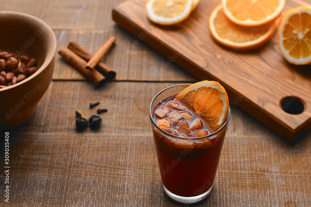 Christmas mulled wine on a wooden table Christmas mulled wine on a wooden table