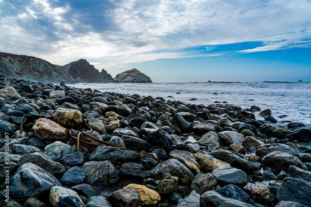 Black rocks on the beach in California