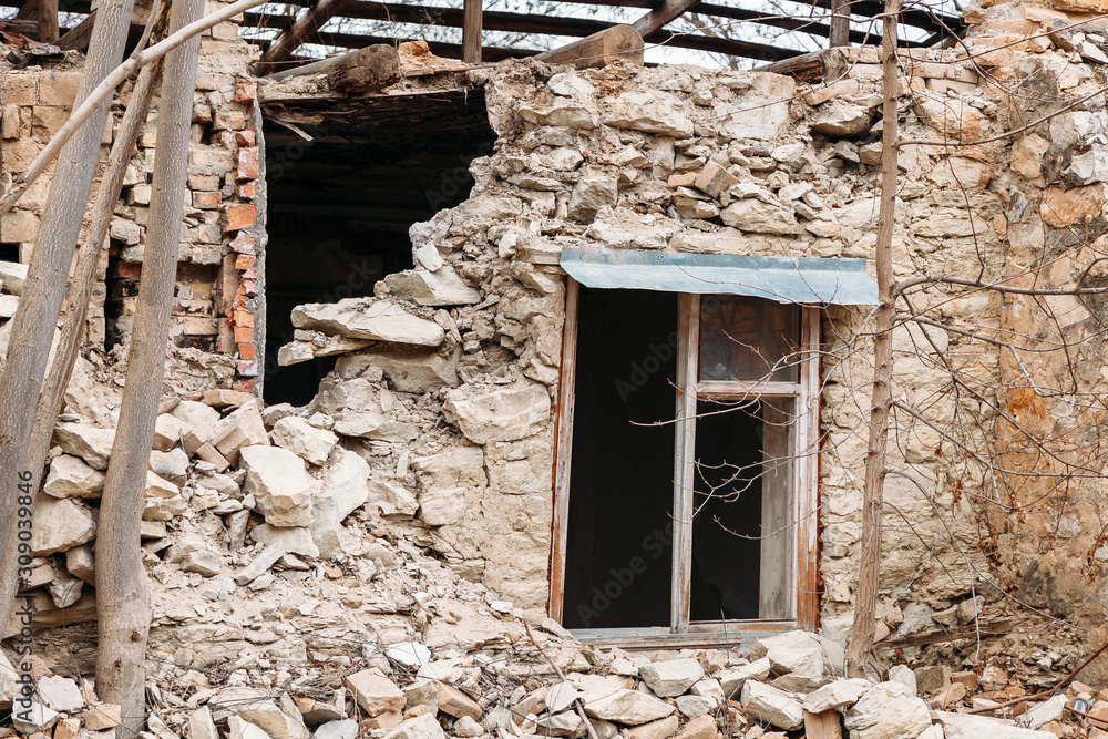 Destroyed building, can be used as demolition, earthquake, bomb, terrorist attack or natural disaster concept Destroyed building, can be used as demolition, earthquake, bomb, terrorist attack or natural disaster concept