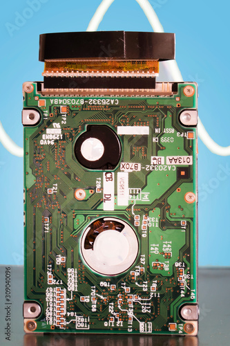 Computer circuit board used for electronic calculations with sine wave for measuring current . photo