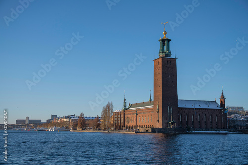 Water view over Stockholm Town City Hall a snowy and sunny Nobel price day. © Hans Baath