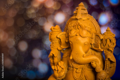 idle of lord ganesha on glitter background © Mohith Gowda