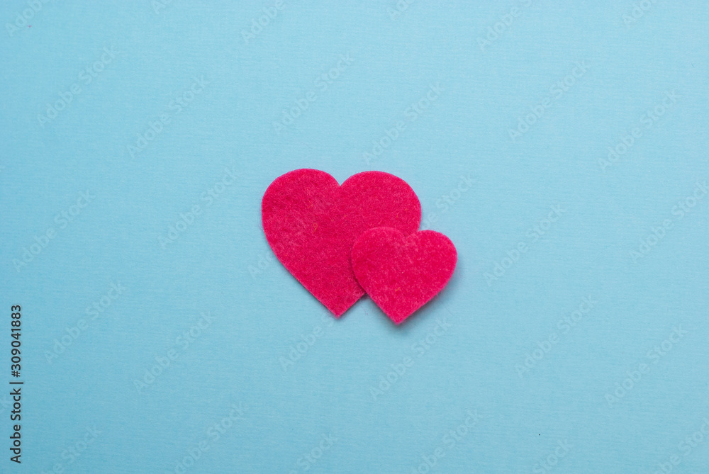 pink hearts on blue background, flatlay, St Valentine's composition
