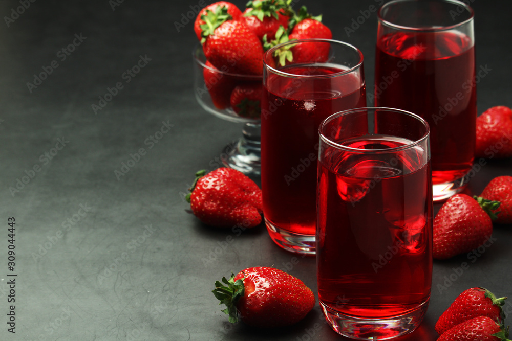Glasses with strawberry drink with ice Glasses with strawberry drink with ice